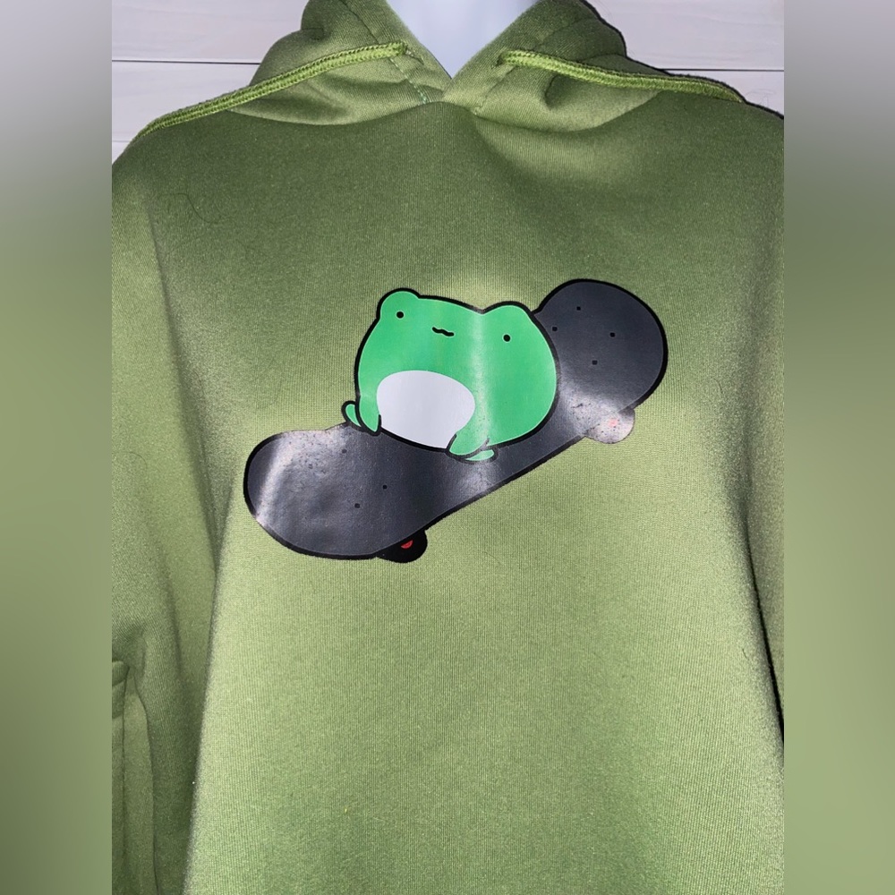 Lightly worn large lime green skateboarding frog hoodie, polyester outside
